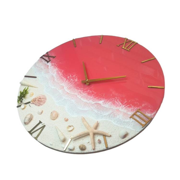 ساعت دیواری رزینی طرح دریای صورتی چابهار