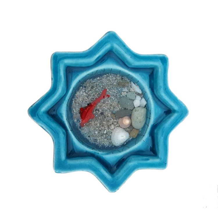 حوض ماهی رزینی هفتسین با ماهی خمیری و شن و صدف